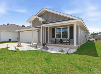 Welcome to this beautifully maintained 4-bedroom, 2-bath home in - photo 2