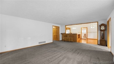 Discover comfort & tranquility in this beautiful 3-bedroom (one - photo 3