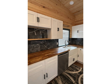 Welcome to your perfect lake retreat! This beautiful designed - photo 6