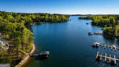 Build your dream lakefront retreat on this exceptional 1.09-acre - photo 6