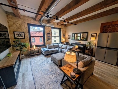 This beautifully maintained, open-concept condo/loft at River - photo 9