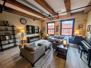 This beautifully maintained, open-concept condo/loft at River - photo 10