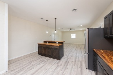 HUGE $75,000 REDUCTION!!! DISCOVER THE ULTIMATE SETUP FOR LIVING - photo 11