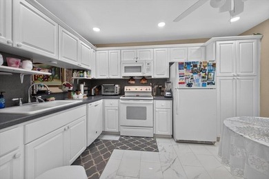 Welcome to this charming 2-bedroom, 2-bathroom condominium in - photo 12
