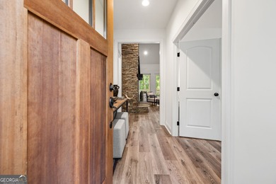 Nestled in the gated community of The Orchard Golf & Country - photo 4