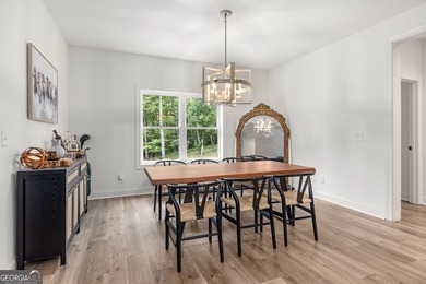 Nestled in the gated community of The Orchard Golf & Country - photo 8