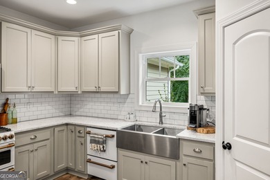 Nestled in the gated community of The Orchard Golf & Country - photo 9