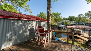 This Cape Cod cottage offers the quintessential lake escape - photo 22
