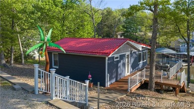 This Cape Cod cottage offers the quintessential lake escape - photo 25