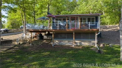 This Cape Cod cottage offers the quintessential lake escape - photo 26