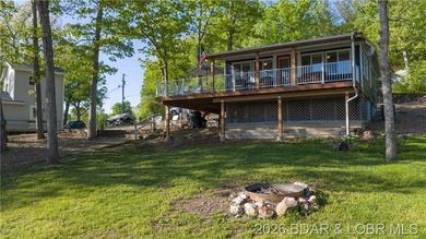 This Cape Cod cottage offers the quintessential lake escape - photo 28