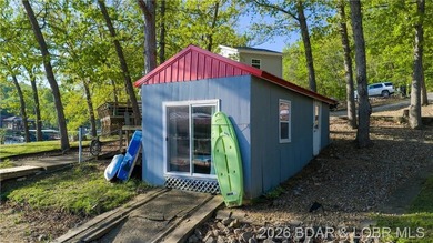 This Cape Cod cottage offers the quintessential lake escape - photo 29