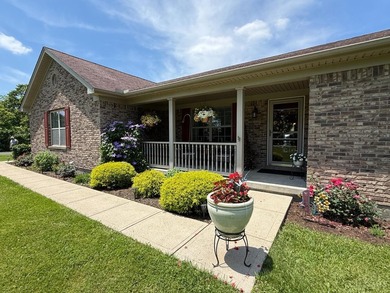 Absolutely immaculate custom brick ranch home in the gated - photo 2