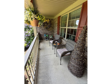 Absolutely immaculate custom brick ranch home in the gated - photo 3