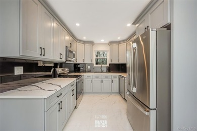 Welcome to this beautifully renovated 4-bedroom, 2.5-bath home - photo 9