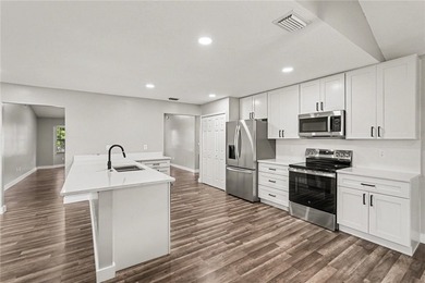 This beautifully updated 4-bedroom 3 bath home offers split plan - photo 11