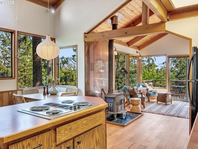 Escape to this treehouse-like retreat tucked safely high on a - photo 12