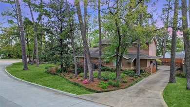 Tucked beneath towering mature trees, this sprawling ranch home - photo 3