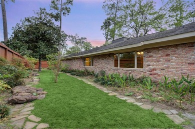 Tucked beneath towering mature trees, this sprawling ranch home - photo 8