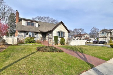 Welcome to 2 Oak Place, Massapequa - A Beautifully Expanded Cape - photo 3