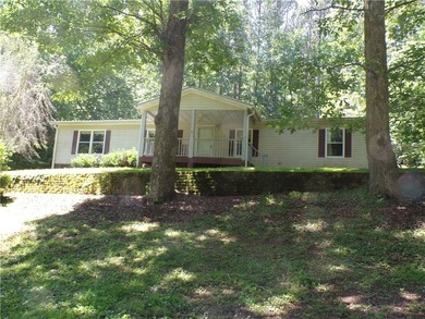 Peaceful Country Living with this 3-bedroom, 2-bath mobile home - photo 1