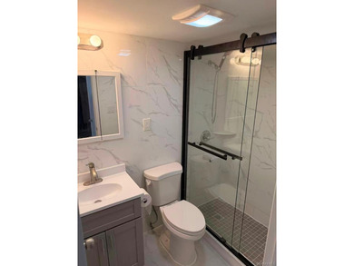 Newly renovated 1-bedroom condo with a spacious living room and - photo 9