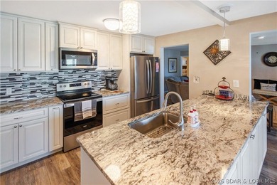Enjoy lake life at its best in this beautifully updated - photo 14