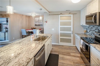 Enjoy lake life at its best in this beautifully updated - photo 16