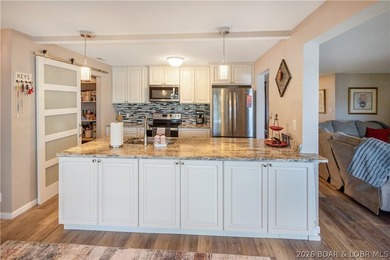 Enjoy lake life at its best in this beautifully updated - photo 17