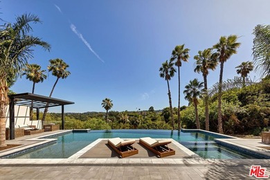 Set in the scenic hills of Encino, this brand-new construction - photo 22