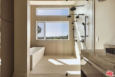 Set in the scenic hills of Encino, this brand-new construction - photo 24