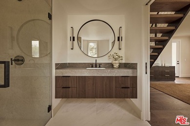 Set in the scenic hills of Encino, this brand-new construction - photo 28