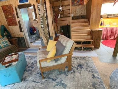 Featuring five acres of wooded privacy and a rustic cabin. Enjoy - photo 5