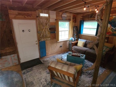 Featuring five acres of wooded privacy and a rustic cabin. Enjoy - photo 6