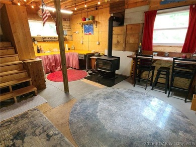 Featuring five acres of wooded privacy and a rustic cabin. Enjoy - photo 8