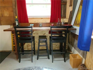 Featuring five acres of wooded privacy and a rustic cabin. Enjoy - photo 10
