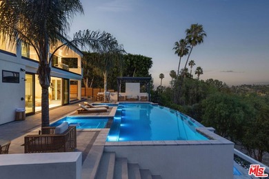 Set in the scenic hills of Encino, this brand-new construction - photo 40
