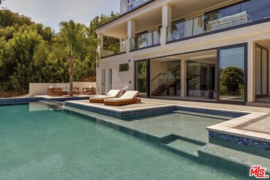 Set in the scenic hills of Encino, this brand-new construction - photo 41