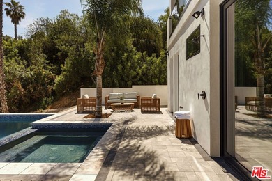 Set in the scenic hills of Encino, this brand-new construction - photo 42