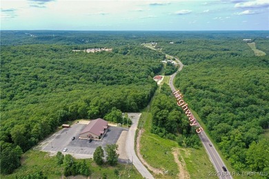 This expansive 5-acre commercial lot boasts exceptional frontage - photo 2