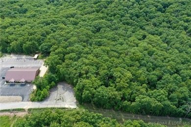 This expansive 5-acre commercial lot boasts exceptional frontage - photo 10