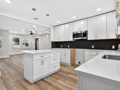 Fully renovated in 2025, this move-in ready 3-bedroom, 2-bath