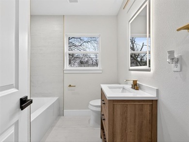 Fully renovated in 2025, this move-in ready 3-bedroom, 2-bath