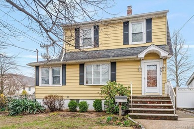 Welcome to this Charming Colonial in the heart of Bellmore. This - photo 1