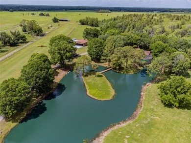 Set within 34+- acres of protected Florida ranchland, this - photo 4