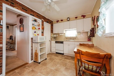 Welcome to this Charming Colonial in the heart of Bellmore. This - photo 6