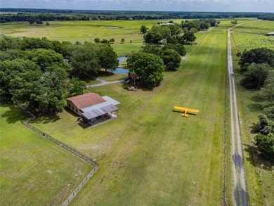 Set within 34+- acres of protected Florida ranchland, this - photo 8
