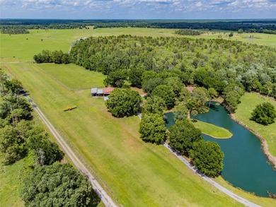 Set within 34+- acres of protected Florida ranchland, this - photo 10