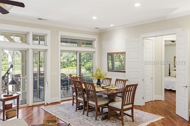 Tucked into a serene waterfront setting where towering trees - photo 12