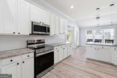 Experience refined one-level living in this beautifully - photo 15